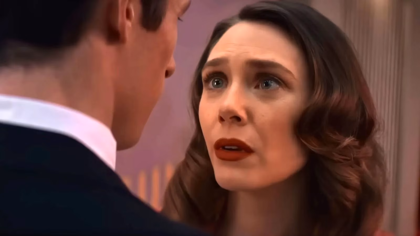 elizabeth-olsen-s-eternity-explores-love-and-choice-in-a-bureaucratic-afterlife-image-0